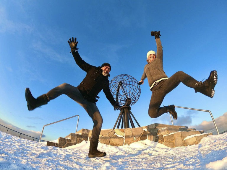 You can become THIS happy when reaching the end of the world. Or maybe it's the ice?