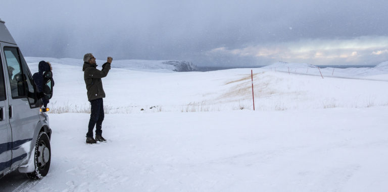 Photo stop. The North Cape is all the way in the back, with its known horn © North Cape Tours